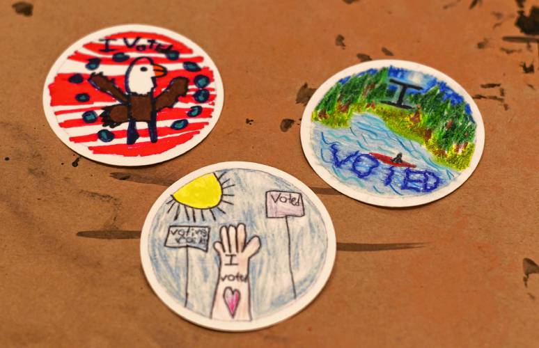 The three winning designs for “I voted” stickers at Sunderland Elementary School.