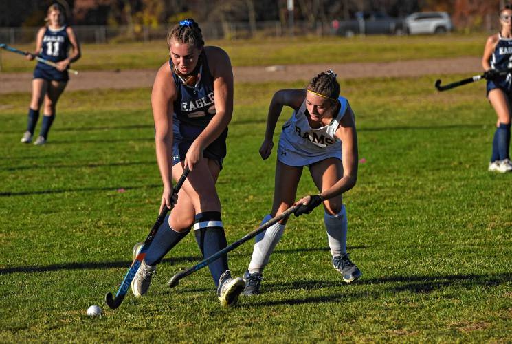 Franklin Tech’s Lilianna Inman (20), left, carries the ball against Southwick during the visiting Eagles’ 4-0 loss in the Western Mass. Class B semifinals on Wednesday in Southwick.