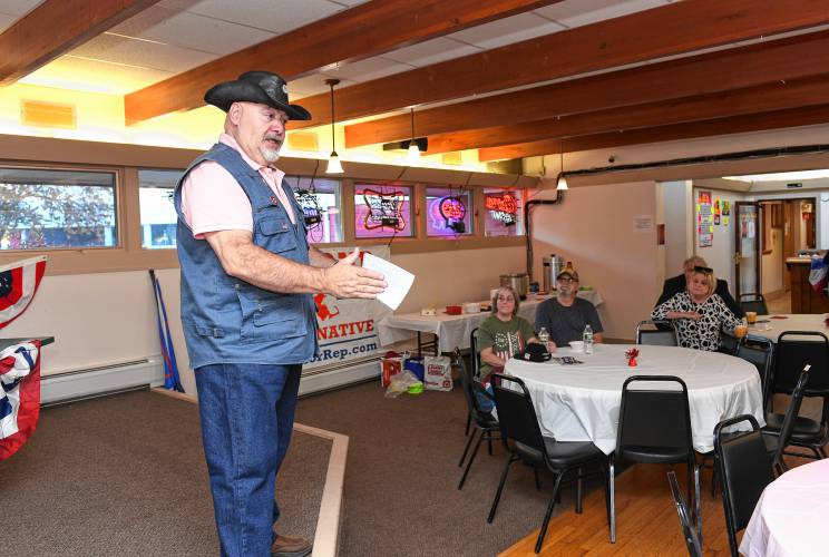 Republican candidate Jeffrey Raymond, seeking a seat on the state House of Representatives, speaks at a meet-the-candidates event at the Orange American Legion on Tuesday.