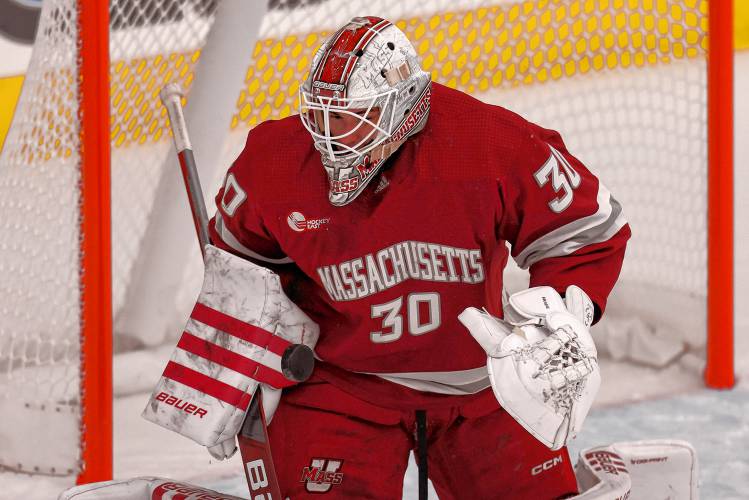 Massachusetts goalie Michael Hrabal (30) stops the puck against Bentley earlier this season in Waltham.