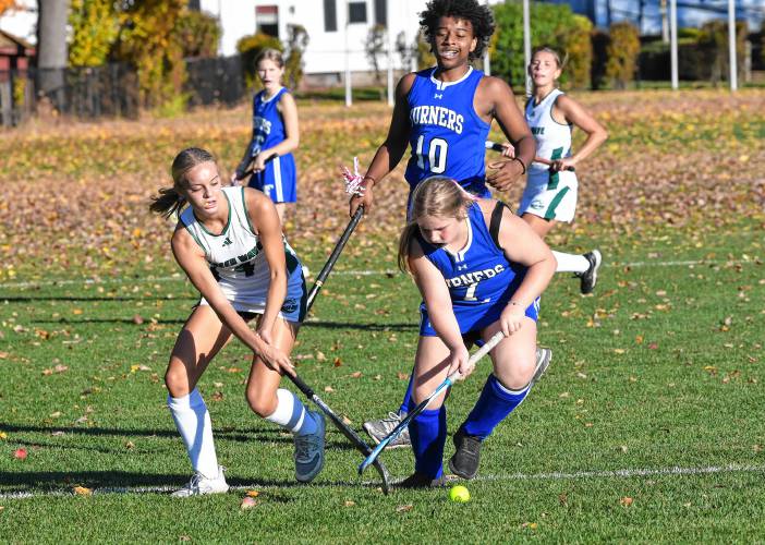 Greenfield’s Henley Gilstrap and Turners Falls’ Mariah Larson vie for the ball in Greenfield on Thursday.