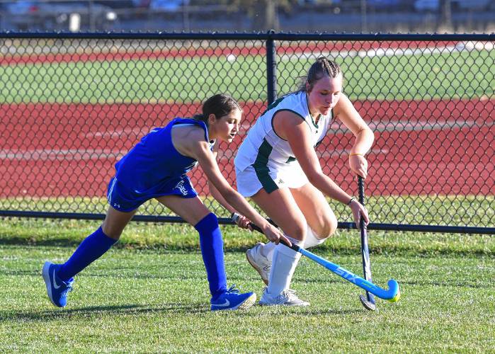 Turners Falls’ Jessi Berry and Greenfield’s Madison Lemay vie for the ball in Greenfield on Thursday. 