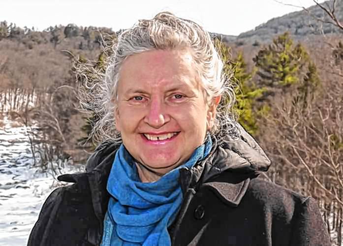 Hetty Startup in Shelburne Falls with the Deerfield River in the background.