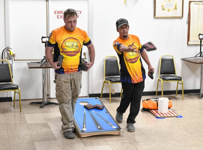 Michael Shedd, left, of Bernardston, and David Knox, of Greenfield, are the organizers of the Franklin County Baggers cornhole league that meets at the Montague Elks Lodge 2521 on Wednesday evenings.