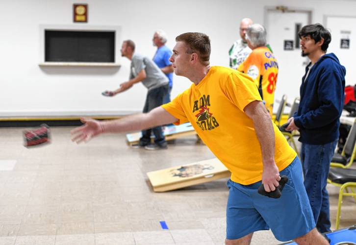 Tyler Lavin of Turners Falls, participates in the Franklin County Baggers cornhole league at the Montague Elks Lodge 2521 on Oct. 9.