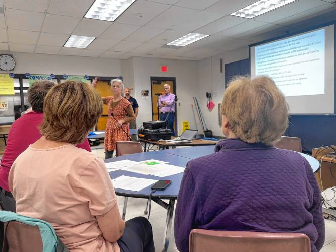 Barbara “Bee” Jacque speaks on behalf of the Northfield Building Committee to present a proposal for a new Northfield EMS site during an information session at Northfield Elementary School on Wednesday.