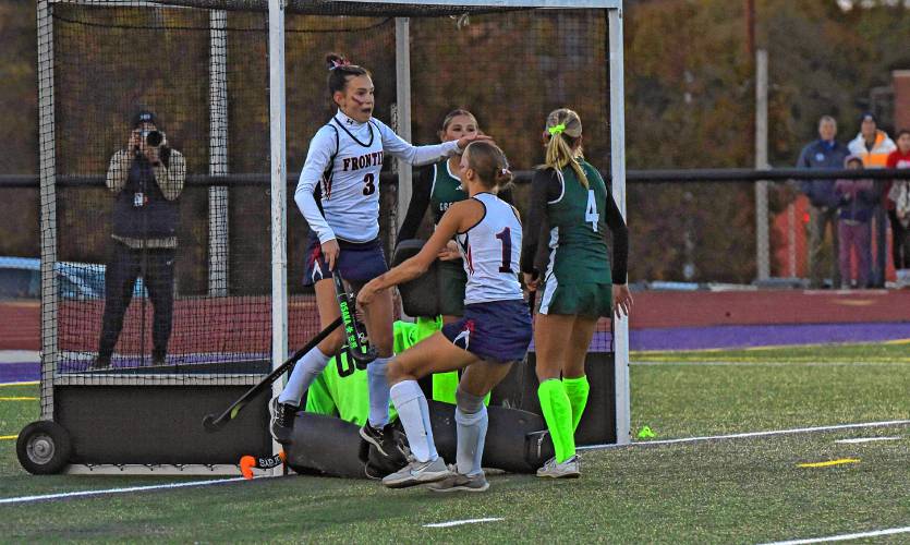 Frontier’s Rowan Reilly (3), left, and Macy DeMaio (1) celebrate after scoring a goal in the first half of the Redhawks’ 2-0 victory over Greenfield in the Western Mass. Class C final on Monday