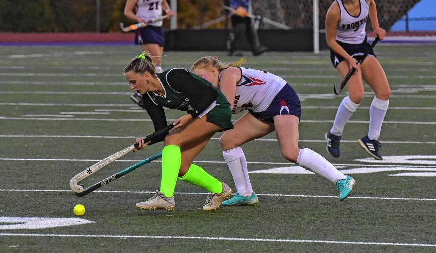 Greenfield’s McKenzie Boswell (3) holds possession in front of Frontier’s Abbi Grover (16) during the Redhawks’ 2-0 victory in the Western Mass. Class C final on Monday night in Holyoke.