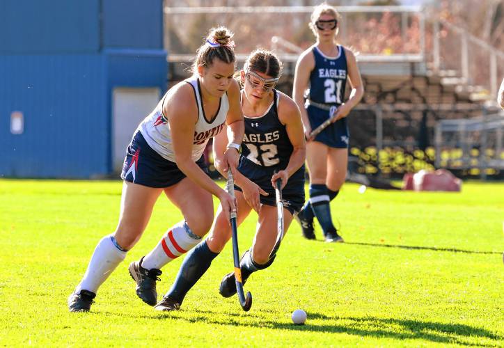 Frontier’s Claire Kirkendall, left, is pursued by Franklin Tech’s Katy Lengieza during the host Redhawks’ 6-1 win in the MIAA Division 4 Round of 32 on Friday in South Deerfield.