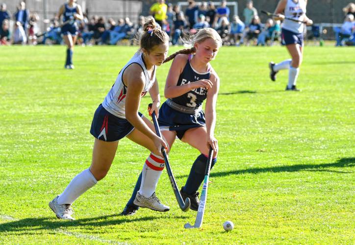 Frontier’s Ashley Taylor, left, and Franklin Tech’s Nora Cutting vie for the ball during the host Redhawks’ 6-1 win in the MIAA Division 4 Round of 32 on Friday in South Deerfield.