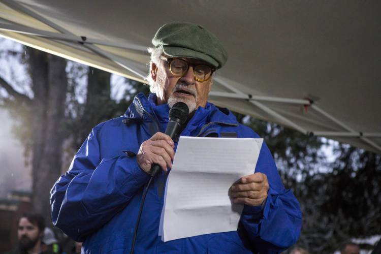 Wildlife photographer Thomas Mangelsen, who captured photos of grizzly bear No. 399, speaks about the life of No. 399 at a candlelight vigil in Jackson, Wyo., Saturday, Nov. 2, 2024.