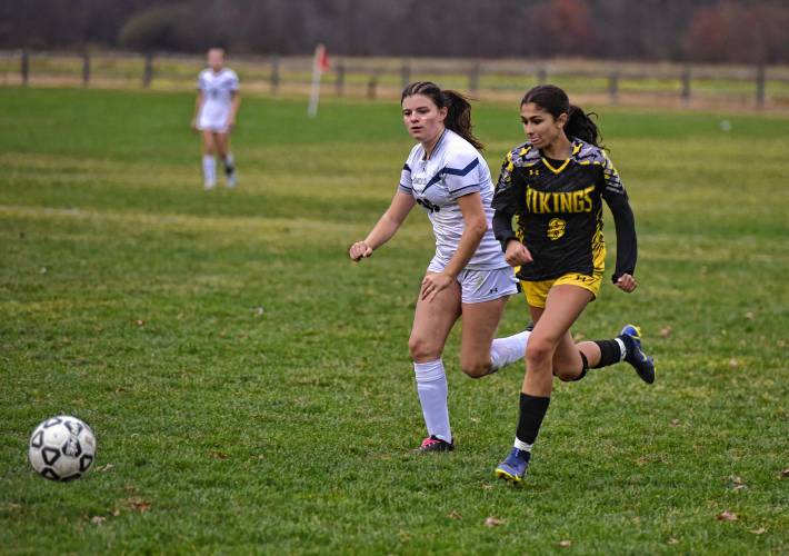 Franklin Tech’s Ariel Peters, left, chases down Smith Vocational’s Monique Fredette (8) during the visiting Eagles’ 1-0 loss in the MIAA Division 5 preliminary round on Monday at Florence Fields in Northampton.