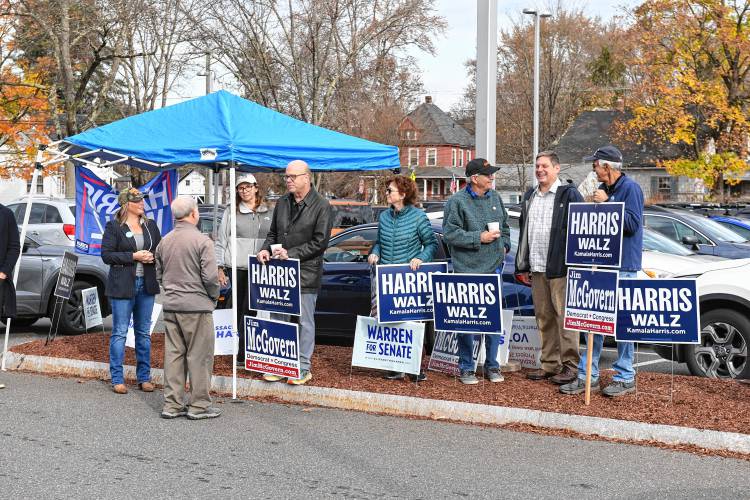 Democrats, including state Rep. Natalie Blais and Congressman Jim McGovern, outside the polls at Greenfield High School on Tuesday.