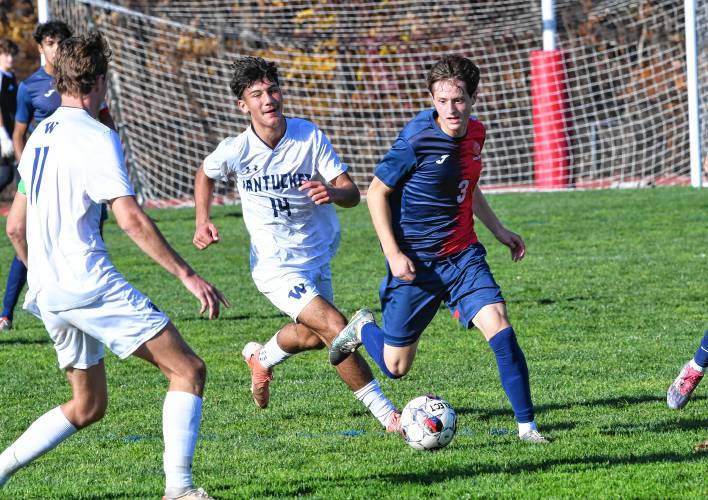 Frontier’s Diego Frazier dribbles while defended by Nantucket’s Stoyan Popov during an MIAA Div. 4 Round of 32 contest in South Deerfield Tuesday.  