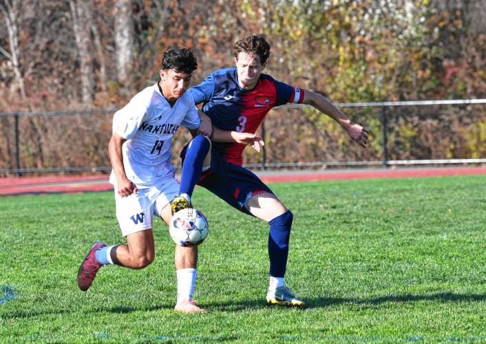 Nantucket’s Stoyan Popov battles Frontier’s Diego Frazier for the ball during an MIAA Div. 4 Round of 32 contest in South Deerfield Tuesday. 