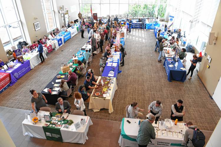 People attend a job fair organized by the MassHire Franklin Hampshire Career Center at Greenfield Community College in Greenfield on Thursday.