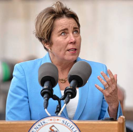 Gov. Maura Healey looks up at the construction of the Veterans Home in Holyoke during a “topping off” ceremony on Thursday afternoon, Novemeber7, 2024.