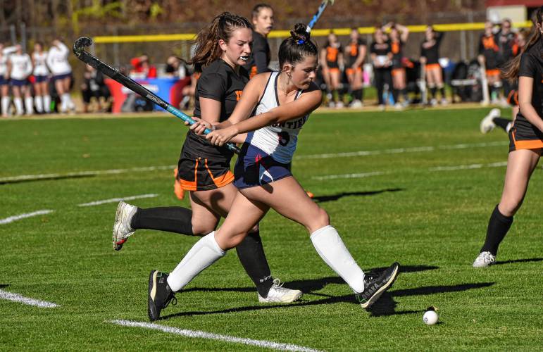 Frontier’s Amelia Bouchard (8) winds up for a pass into the circle during the Redhawks’ 2-0 win over Ipswich in the MIAA Division 4 quarterfinal round on Saturday in South Deerfield