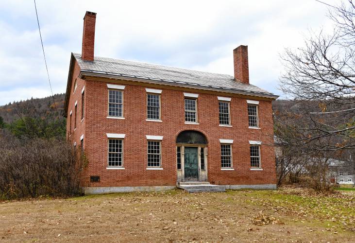 During a Charlemont Selectboard meeting on Nov. 4, members discussed some of the abandoned properties in town and how they can support converting them back into usable homes, such as 4101 Route 2, pictured, the brick house next to The Academy at Charlemont.