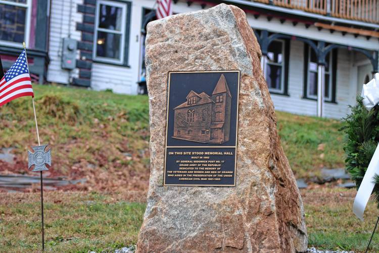 The bronze plaque honoring the former Memorial Hall at the corner of Prospect and High streets in Orange.