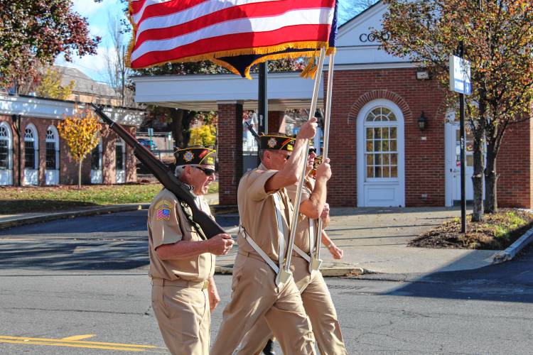 The Veterans of Foreign Wars Post 3295 Rifle Team marches down Federal Street in the Greenfield Veterans Day parade on Monday.