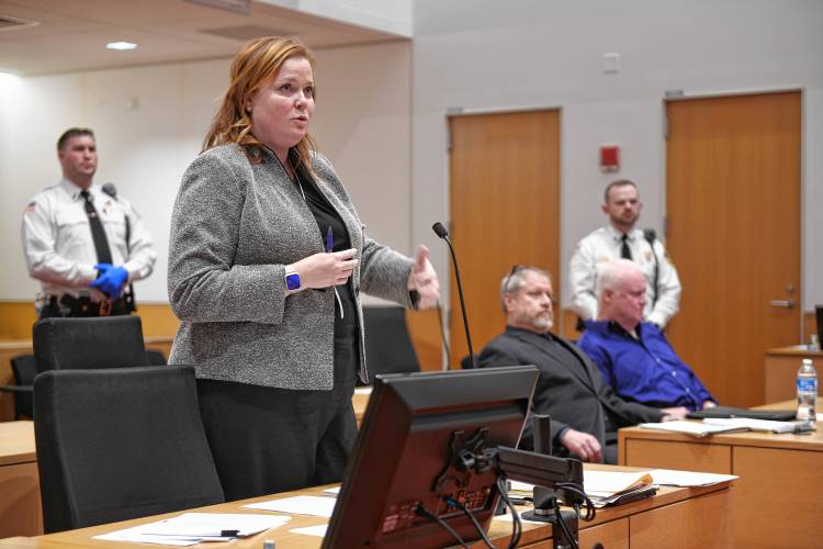 Assistant District Attorney Jennifer Suhl speaks in Franklin County Superior Court on Nov. 4. At right is defense attorney Michael Fellows and his client, Lewis H. Starkey III. Starkey is serving a life sentence for killing Amanda Glover and attempting to murder Glover’s adult son, Devin, on July 5, 2017, in Wendell.