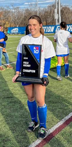 Assumption's Racquel Provost after winning the Northeast-10 Championship in Worcester Sunday. 