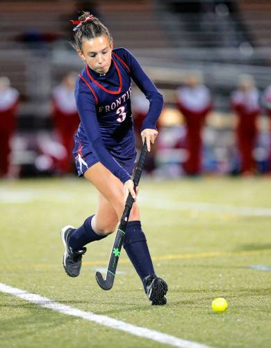 Frontier’s Rowan Reilly (3) carries the ball upfield against Uxbridge in the first half of the MIAA Div. 4 field hockey state semifinal Tuesday at Agawam High School.