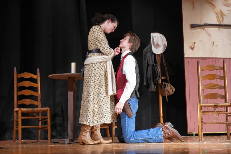 Eliza Van Driesche as Gwendolen and Mason Smith as Jack rehearse a scene from “The Importance of Being Earnest” being put on by Frontier Regional School in South Deerfield. Performances start Friday.