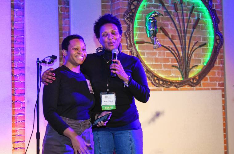 Traci Talbert, right, racial justice community engagement director with the Franklin County Community Development Corporation, introduces speaker Mari Champagne during the Franklin County CDC’s 45th annual meeting at Hawks & Reed Performing Arts Center in Greenfield on Wednesday.