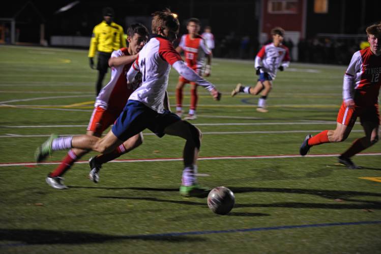 Frontier’s Ian Paciorek drives to the net against Tyngsborough in an MIAA Div. 4 quarterfinal contest in Tyngsborough on Thursday. 