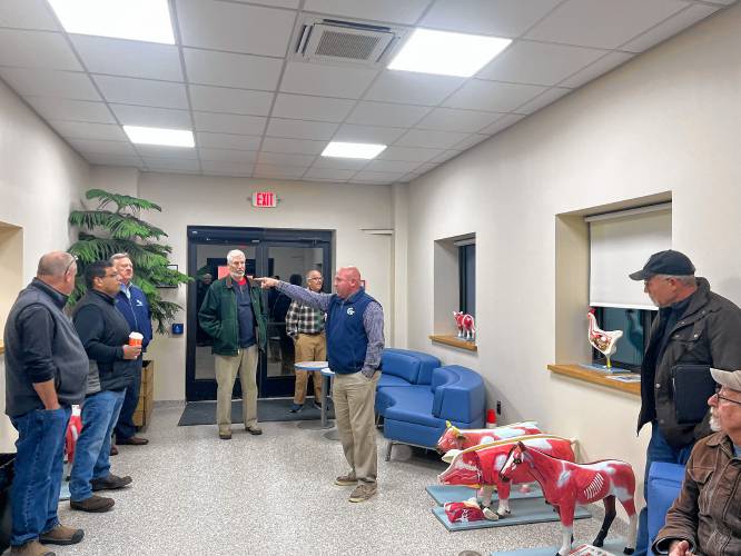 Franklin County Technical School Principal Brian Spadafino provides a tour of the new veterinary science building on campus Wednesday night. The nearly $1.5 million building will provide students with hands-on education in veterinary science, and will act as a clinic with a veterinarian on site teaching students. 