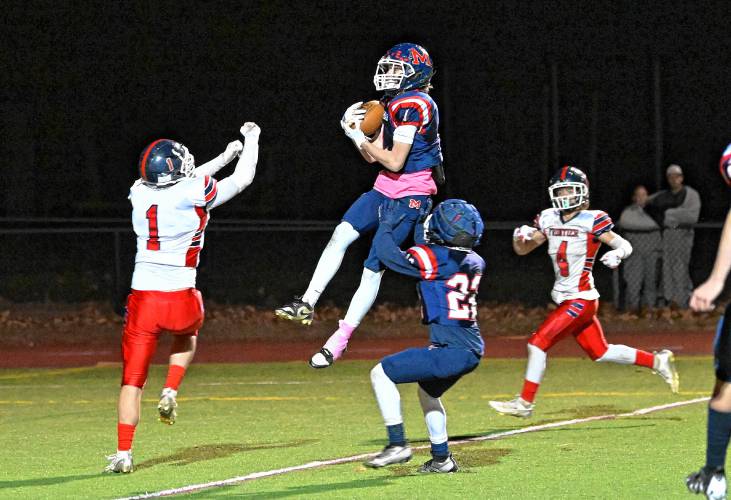 Mahar’s Morgan Softic intercepts a pass from Frontier’s Kaden James in Orange Friday night.