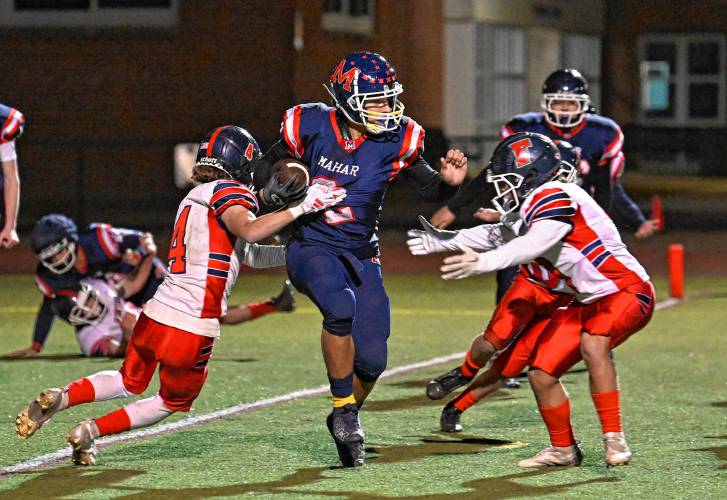 Mahar’s Jayden Delgado runs against Frontier in Orange Friday night.