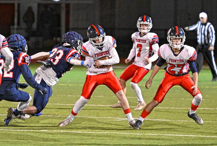 Frontier’s Jaxon Spearance returns a kickoff against Mahar in Orange Friday night.