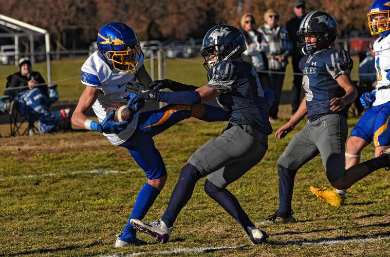 Franklin Tech’s Cam Laster (11), right, breaks up a pass intended for Assabet Valley’s Miles Braddix (2) on a two-point conversion during the Eagles’ 20-14 loss in the state vocational quarterfinals on Saturday in Turners Falls.