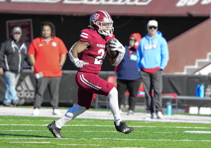 UMass running back Jalen John breaks free for a long gainer against Liberty during the Minutemen’s 35-34 overtime loss on Saturday at McGuirk Alumni Stadium in Amherst.