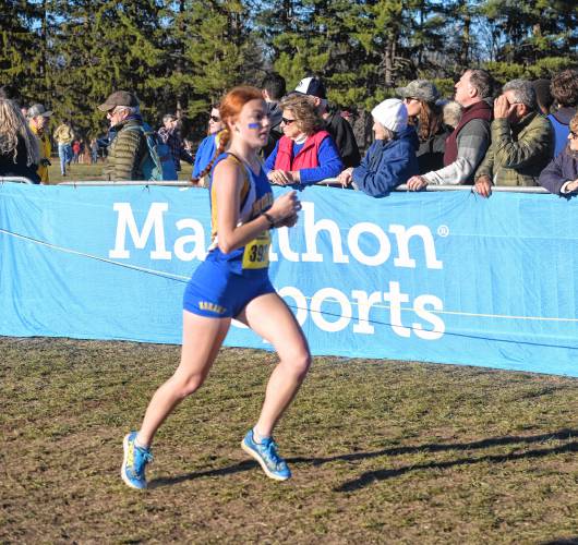 Mohawk Trail’s Natalie Lanoue runs to the finish line during the MIAA Div. 3 State Cross Country Championship at Fort Devens on Saturday.