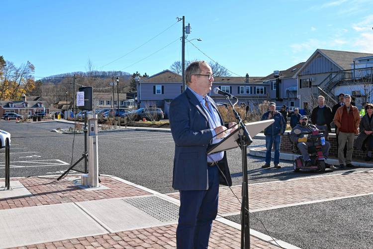 Deerfield Selectboard Chair Tim Hilchey speaks at the ribbon-cutting ceremony for the new Leary Lot in the center of South Deerfield on Friday.