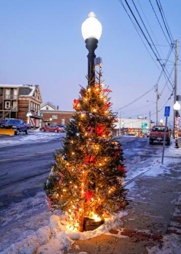  A Lamppost in downtown Orange decorated for the holidays.