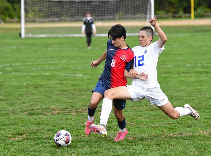 Frontier’s Gus Radner battles a Wahconah player for the ball earlier this season at Herlihy Park. The Redhawks will meet Lynnfield in the MIAA Division 4 semifinals on Tuesday.