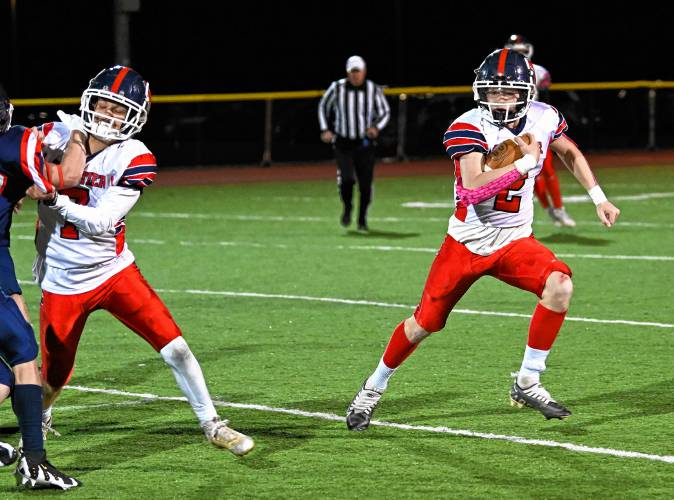 Frontier Regional School’s Garrett Dredge gains yardage against Mahar at the James S. Woodward Athletic Complex in Orange on Nov. 15.