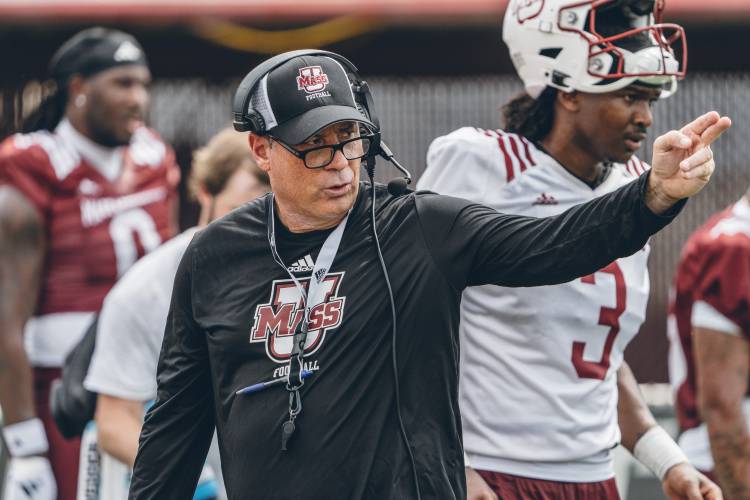 Interim UMass football coach Shane Montgomery works with the team during preseason training camp back in August. Montgomery will coach the Minutemen for their final two games after Don Brown was fired on Monday.