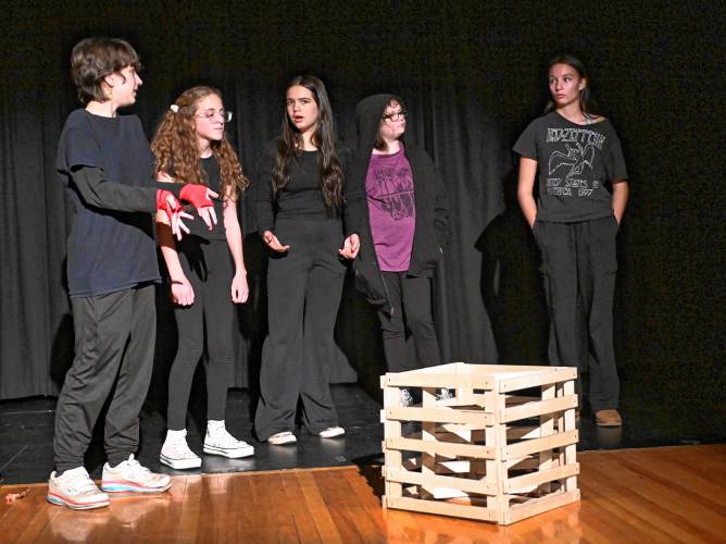 Cast members rehearse a scene for Pioneer Valley Regional School’s production of “This Changes Everything” by Joel Horwood. The public is invited to two showings on Friday, Nov. 22, and Saturday, Nov. 23, each at 7 p.m.