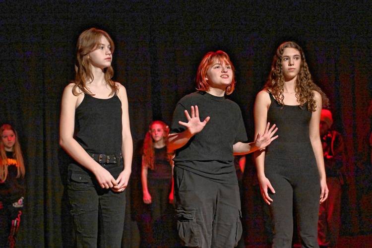 Peyton Stacy, Oliver Heydenreich and Amelia Hescock rehearse a scene for Pioneer Valley Regional School’s production of “This Changes Everything” by Joel Horwood. The public is invited to two showings on Friday, Nov. 22, and Saturday, Nov. 23, each at 7 p.m.