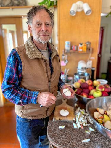 Upon moving to western Massachusetts 35 years ago, Northfield resident Bill Copeland was delighted to discover a wide range of apple varieties growing in our area. He's pictured making sauce, and one of his many hobbies involves fermenting cider to produce a sparkling beverage.