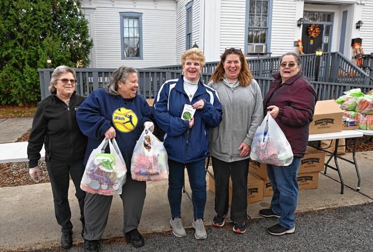 Some of the volunteers helping distribute meals with local DJ Robert “Bobby C” Campbell at the Bernardston Senior Center on Friday afternoon are, from left, Diane Rogers, Barbara Viencek, Wendy Andrews, Jodi Bonin and Sue Gordon.