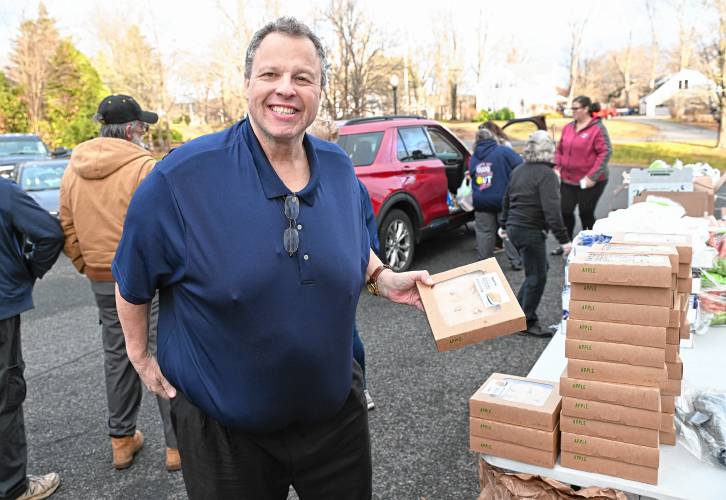 Local DJ Robert “Bobby C” Campbell at the Bernardston Senior Center distributing Thanksgiving meals on Friday afternoon.