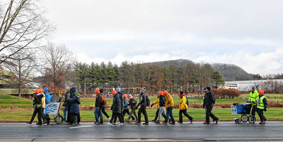 The March for the Food Bank with Monte Belmonte makes its way up Greenfield Road (Routes 5 and 10) in Deerfield on Tuesday.