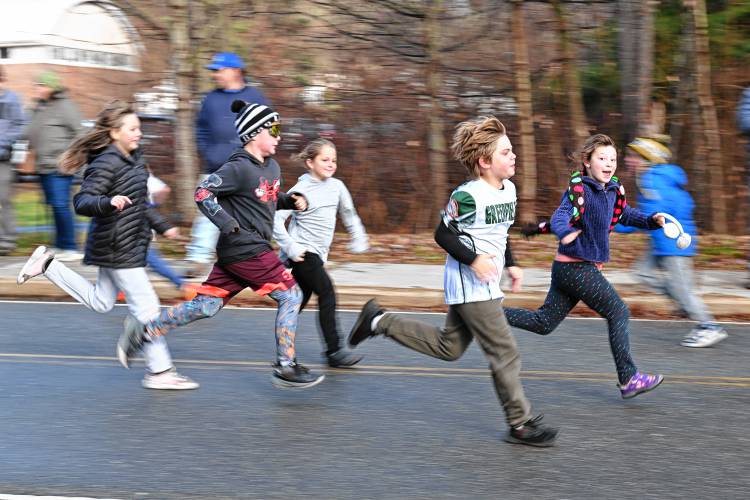 Students at Bernardston Elementary School participate in the annual turkey trot on Wednesday morning.